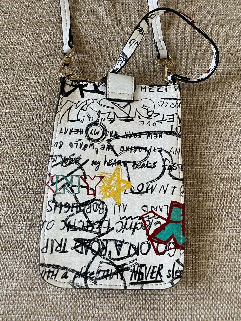 DKNY PHONE CROSSBODY BAG WHITE WITH GRAFFITI NEW YORK CITY NEW